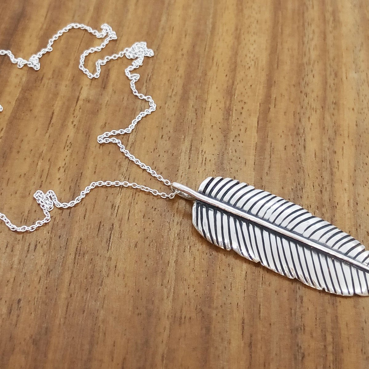 colgante-de-plata-pluma-1.jpg