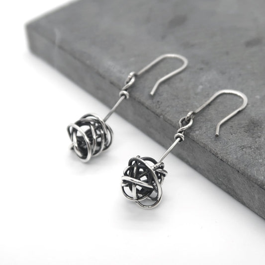 pendientes-de-plata-largos-nido-2.jpg