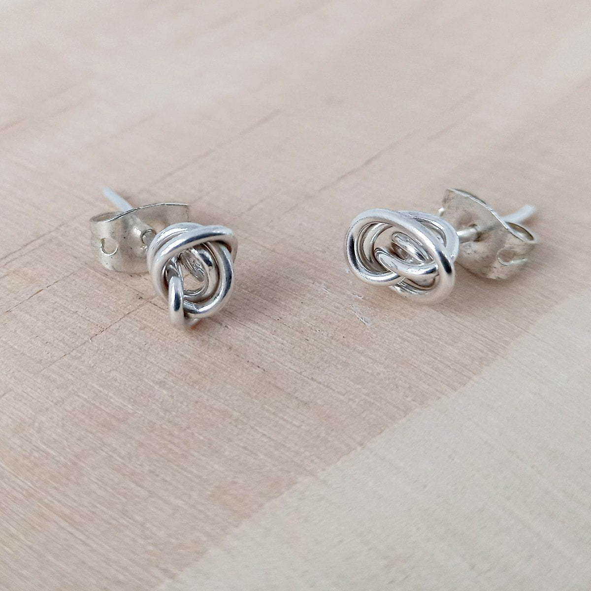 pendientes-plata-nido-pegados-1.jpg